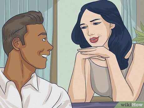 Step 2 Hold eye contact and smile a little to signal that you’re in the mood.