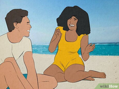 A man and a woman at the beach.